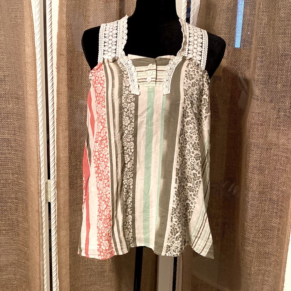 Cabi size Medium woman’s summer blouse. Lace, sweet buttons on the back. So nice